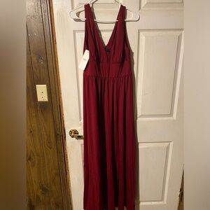 I bought this dress for a wedding as a bridesmaid. It has never been worn.
